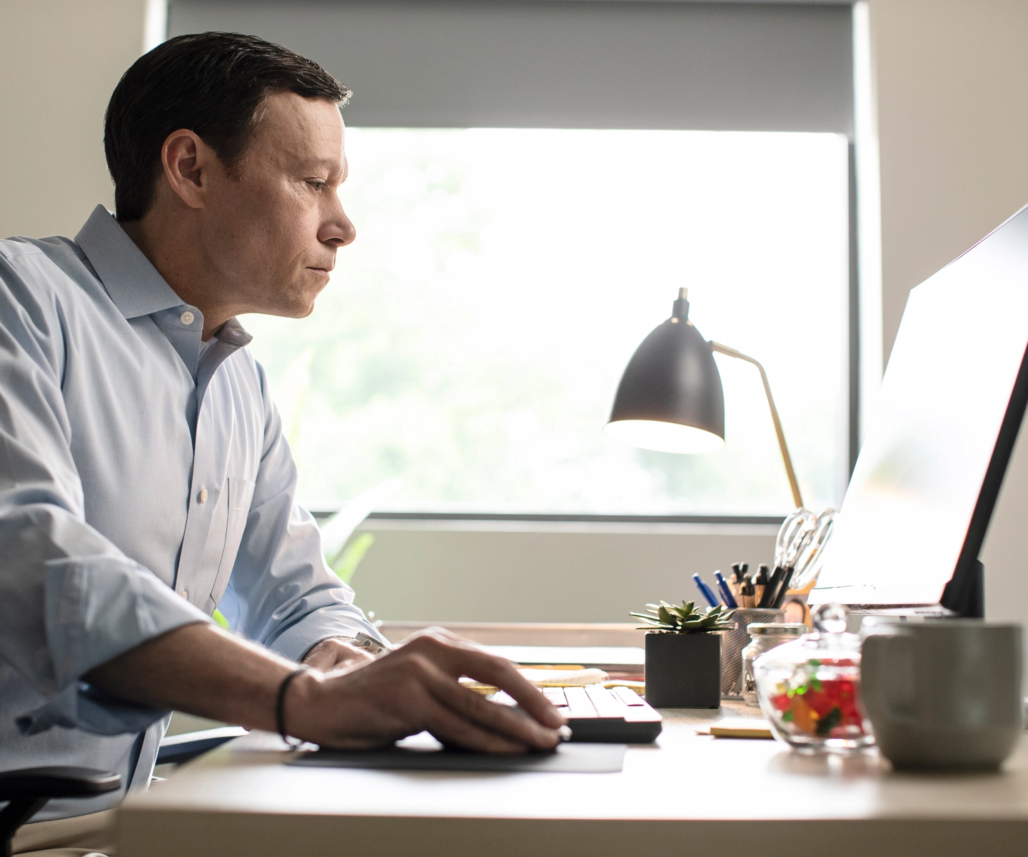 Man working on his desktop computer

SERV1444 Three Year usage. Limited to Internal use at corporate on digital, social and website, with three yea print usage beginning 10/1/2021