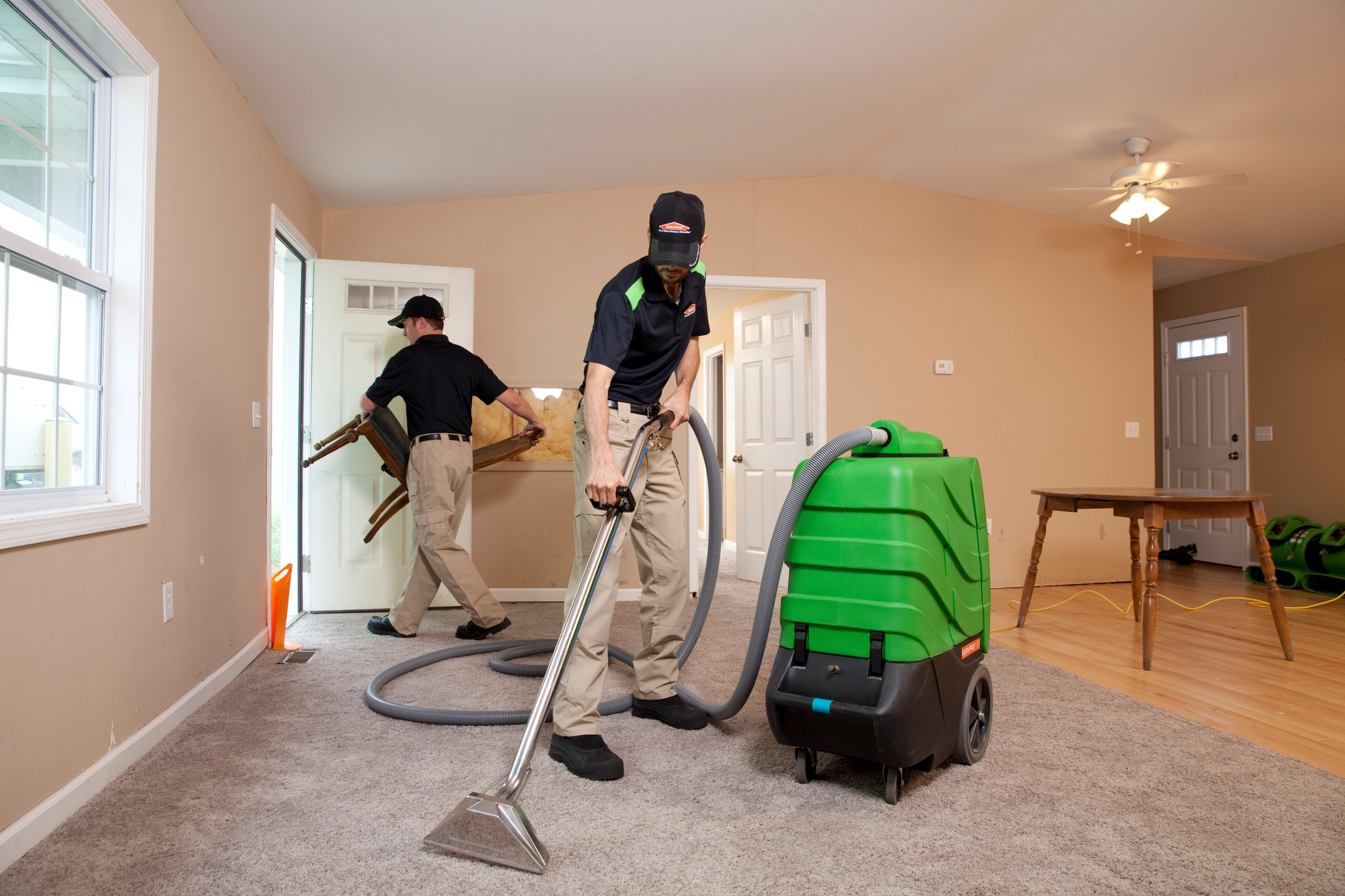 SERVPRO cleaners shampooing carpets