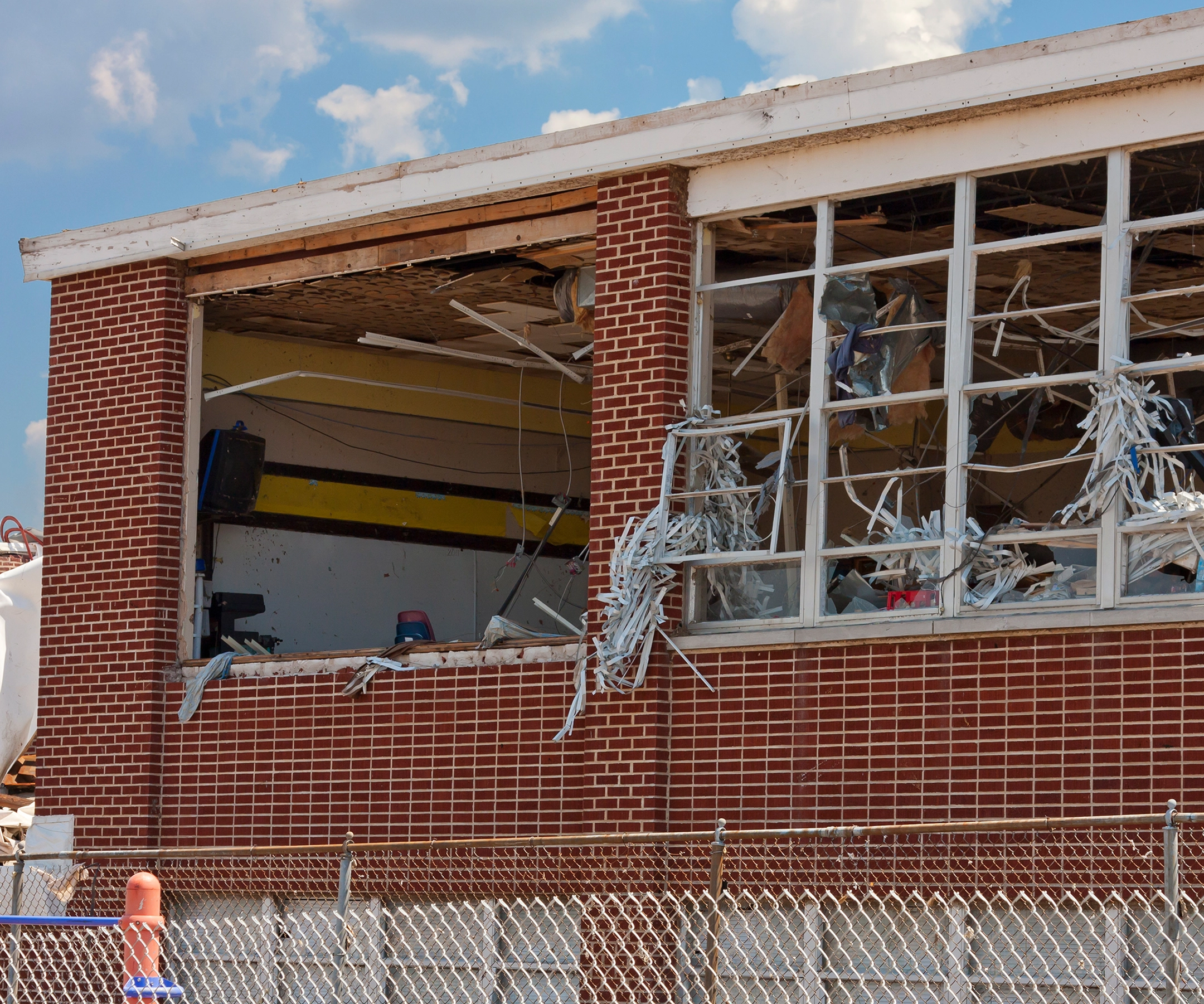 storm damage restoration and hurricane cleanup on damaged building, commercial storm damage restoration, commercial storm restoration, commercial storm cleanup