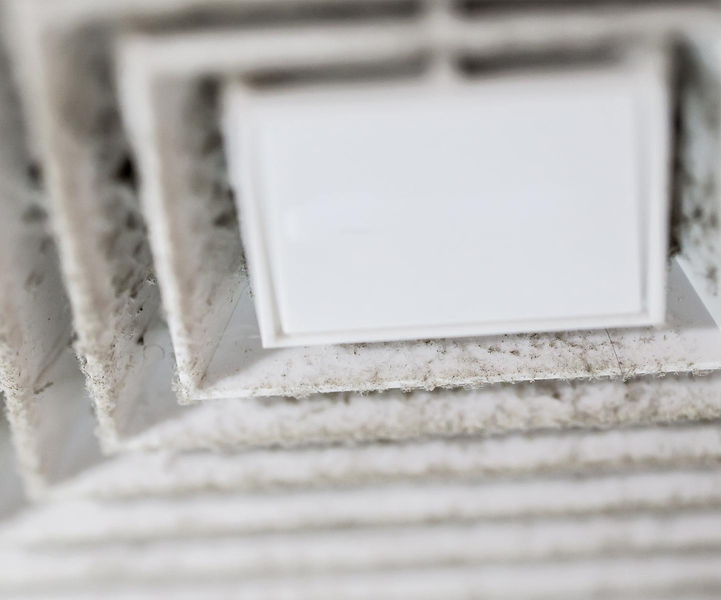 Zoomed in view of dirty HVAC in need of air duct cleaning